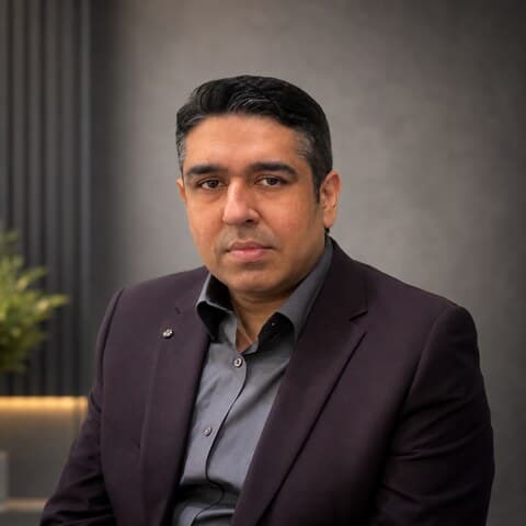 Professional headshot of Arfan Mahmood